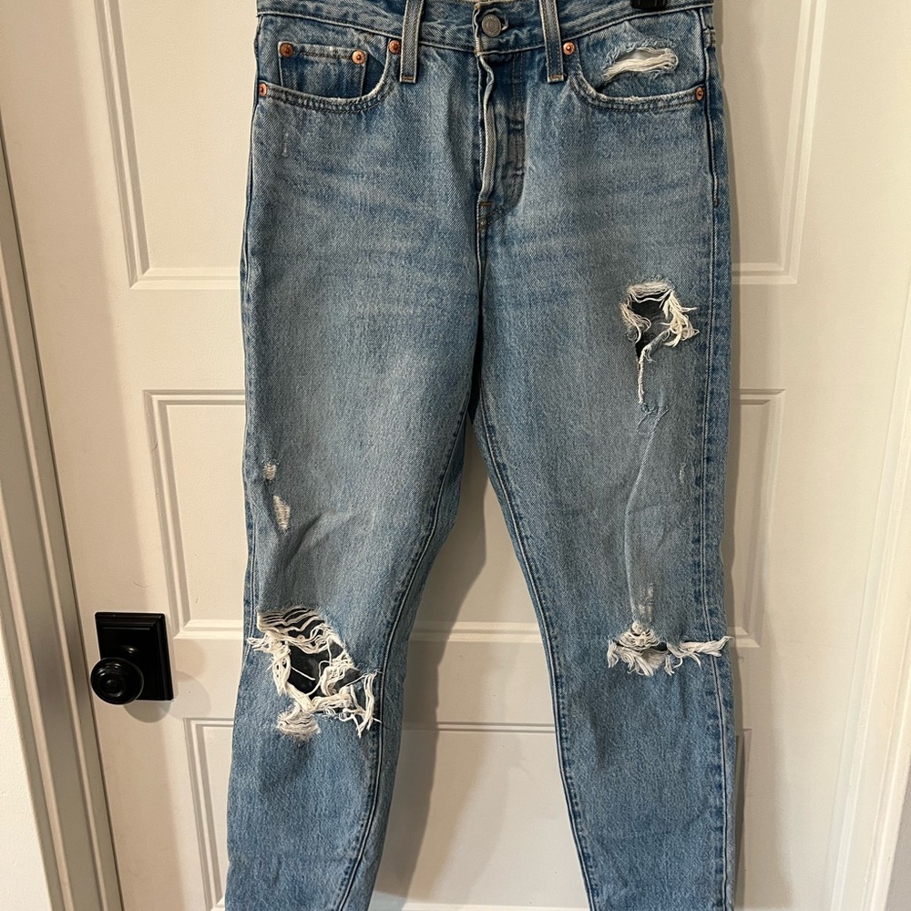 Distressed Levi’s Blue Jeans